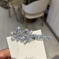 Fermaglio per capelli con fiori di cristallo azzurro brillante e perline su scheda - Azzurro