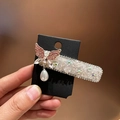 Elegante fermaglio per capelli a farfalla con strass rosa e perla su scheda display - Rosa