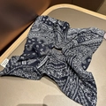 Close-up of navy blue paisley silk hair tie featuring a handmade label and soft texture - Navy Blue Square Scarf