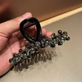 Close-up of handmade crystal beaded hair claw clip with dark grey faceted beads - L Black