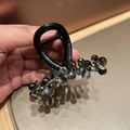 Detail of elegant black shark hair clip with gray faceted crystal bead embellishments - Small Black