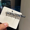 Sparkling crystal hair clip with light blue and white diamonds on dark metal base - Light Blue