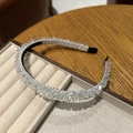 Sweet beaded headband featuring clear faceted crystals on a soft white fabric base - White