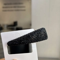 Detailed macro view of a black triangle BB clip with sparkling starry rhinestones - BB Clips / Black