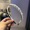 Detailed view of layered headband set with white faux pearls and silver rhinestones - Rhinestone Plus Pearl Double Layer