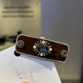 Macro detail of vintage rectangle hair clip with brown velvet and shiny rhinestones - Coffee Hair Clip