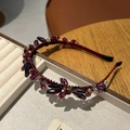 Elegante cerchietto di lusso con cristalli rosso scuro e dettagli in metallo dorato - Borgogna