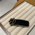 Luxurious black crystal flower hair clip with sparkling white rhinestone edges for women - Black (B82-104)