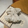 Detail of cream pleated chiffon hair scrunchie with blue gemstone and ribbon bow tie - Beige Style B (BC4-109)