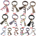 Bracciale portachiavi in pelle con nappa e apriporta senza contatto in 14 modelli - Bracciale E Nappa