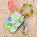 Detail of tropical palm print PU leather card holder with green silicone bead wristlet - Yellow Green Leaf (2603)