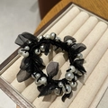 Detail of elegant black mesh hair scrunchie with layered white pearls and organza - Pearl Black Streamer