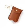 Brown leather travel hand sanitizer bottle keychain holder with gold metal clasp - Brown
