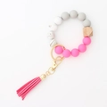 Bracelet porte-clés en perles de silicone rose avec pompon en cuir et perle en bois - Rouge Rose