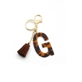 Acrylic leopard print letter G keychain with brown tassel and gold hardware accessory - Letter G(G)