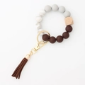Silicone and wooden beaded bracelet keychain with dark brown leather tassel and gold ring - Coffee