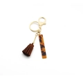 Leopard print resin keychain with brown faux leather tassel and gold metal hardware - Letter I(I)