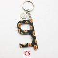 Apriporta senza contatto in acrilico con motivo a girasole e anello in metallo nero - Stile Girasole Nero (C5)