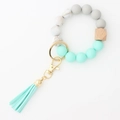 Silicone beaded bracelet keychain with mint green tassel and natural wood bead - Mint Green