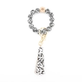 Portachiavi a bracciale con perline leopardate, perla in legno e nappa in pelle PU - Stampa Leopardata Bianca e Nera