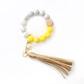 Yellow and grey silicone beaded keychain bracelet with wood bead and tassel accessory - Yellow