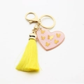 Pink resin heart keychain with golden butterfly details and long yellow silk tassel - Pink Butterfly with Yellow Tassel