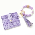 Set portacarte geometrico viola con cinturino di perline e nappa in pelle coordinata - Geometrico Viola