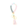 Porte-clés bracelet en perles de silicone avec pompon rose et fermoir doré - Rose-violet