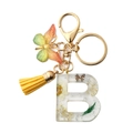 Resin key ring with letter B, dried flowers, butterfly motifs and a yellow tassel - Letter B