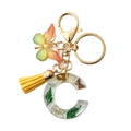 Custom resin letter C keychain with dried flowers, green butterfly, and yellow tassel - Letter C