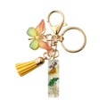 Handmade resin keychain with yellow butterfly pendant, tassel and dried flowers - Letter I