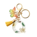 Resin letter Q keychain with yellow dried flowers, silver foil and leather tassel - Letter Q