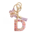 Porte-clés lettre D en résine rose avec paillettes, papillon violet et pompon - Lettre D / Fermoir Boucle 8 + Papillon