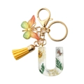 Letter U keychain with real dried flowers, yellow tassel, and butterfly pendant charm - Letter U