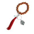 Bohemian keychain with large brown wood beads, red tassel and turquoise leaf charm - Red