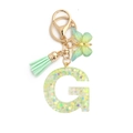 Letter G keychain with green butterfly, resin sequins, and a mint green tassel charm - 8-Loop Clasp + Butterfly / Letter G
