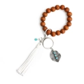 Bohemian beaded wristlet keychain with brown wood beads, white tassel and leaf charm - White
