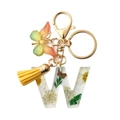 Resin letter W keychain with dried white flowers, yellow tassel, and butterfly pendant - Letter W