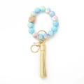 Porte-clés bracelet en perles de silicone marbrées rose et bleu avec pompon en cuir - 11 Bleu Étoilé