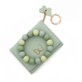 Mint green leather card holder wallet with silicone bead bracelet and butterfly charm - Yellow-Green