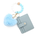 Bracciale in silicone con cuore di peluche azzurro e portacarte in ecopelle - Blu