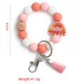 Porte-clés bracelet en perles de silicone avec pompon rose et breloque arc-en-ciel - Style Lettre Groovy Rose (S8)