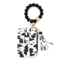 Silicone bead wristlet with black and white cow print card wallet and leather tassel - Big Spotted Cow