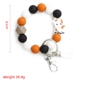 Porte-clés bracelet en perles de silicone vache avec pompon blanc et fermoir argenté - Chèvre Blanc