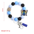 Porte-clés bracelet en perles de silicone bleu ciel avec papillon et gland décoratif - Papillon Bleu