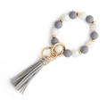 Silicone bead keychain bracelet with grey and white beads, gold ring and leather tassel - Gray