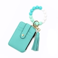 Set portacarte in ecopelle verde acqua con bracciale in silicone e portachiavi a nappa - Verde Menta