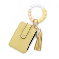Portatessere in pelle PU gialla con cinturino in perline di silicone e nappina chic - Giallo