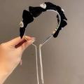 Detail of velvet bow headband with heart rhinestone and sparkling tassel pendants - Rhinestone Bow Style