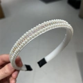 Detail of vintage pearl headband featuring rows of white pearls and sparkling rhinestones - AB Colorful Rhinestone Chain